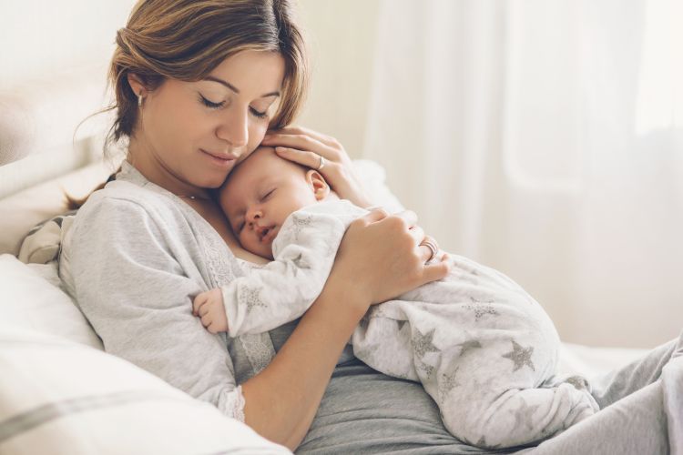 New mom holding her baby