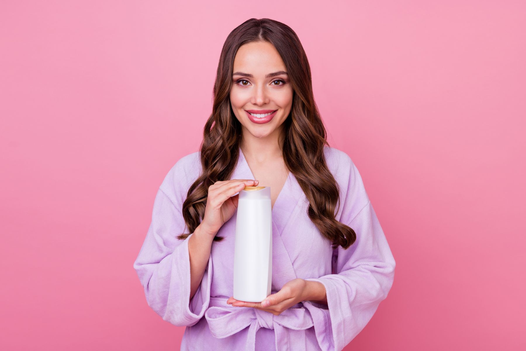 Woman using hair growth shampoo