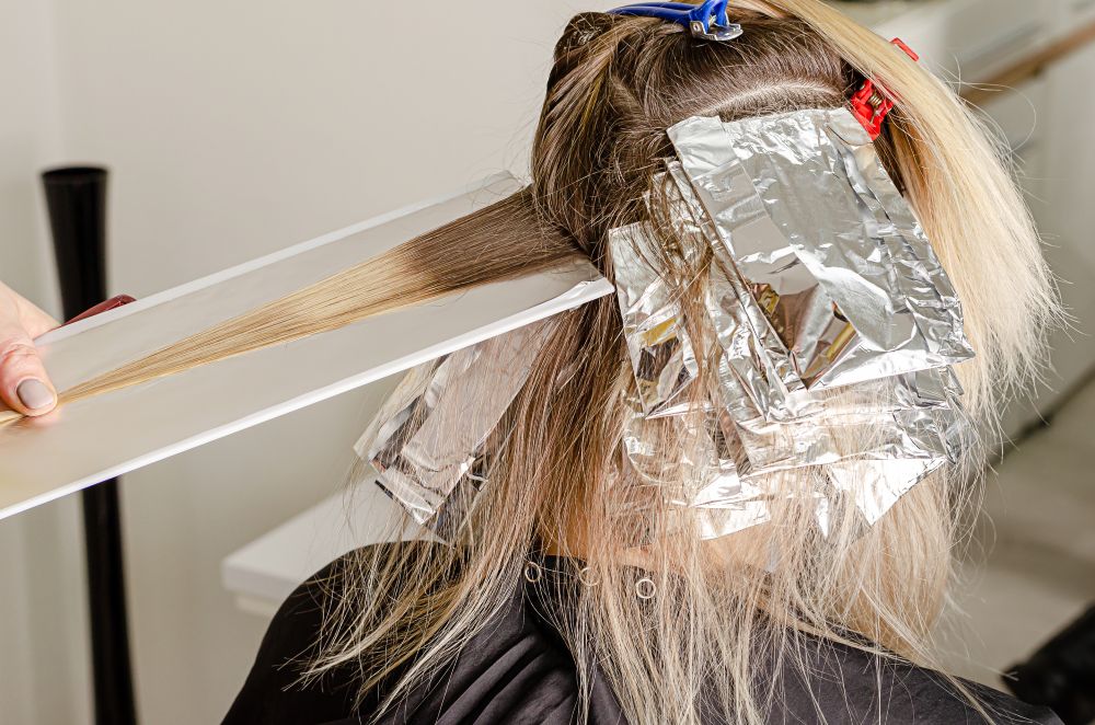 Harsh chemicals in hair treatments or styling products can damage hair