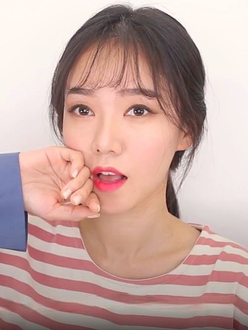woman with see-through bangs