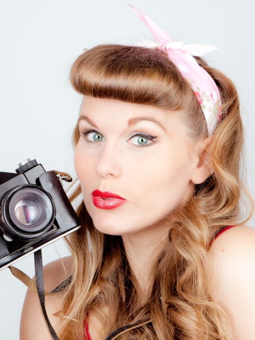 Woman with a victory roll fringe