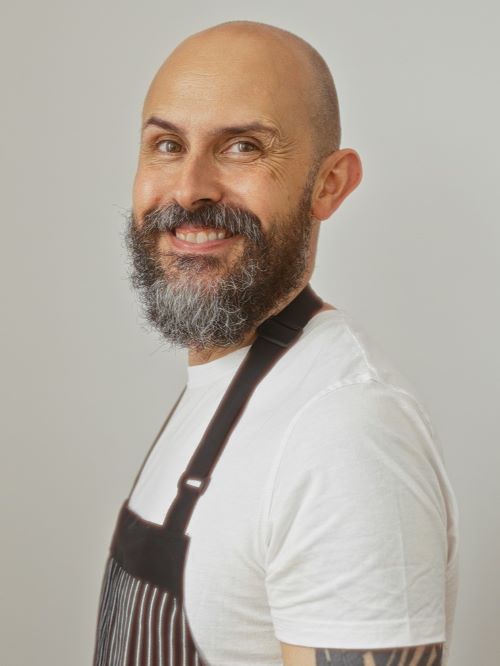 Bald with a full beard