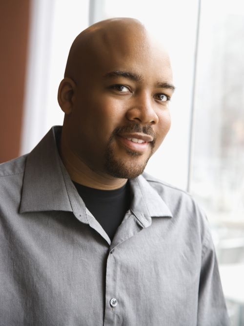 Bald with a short goatee
