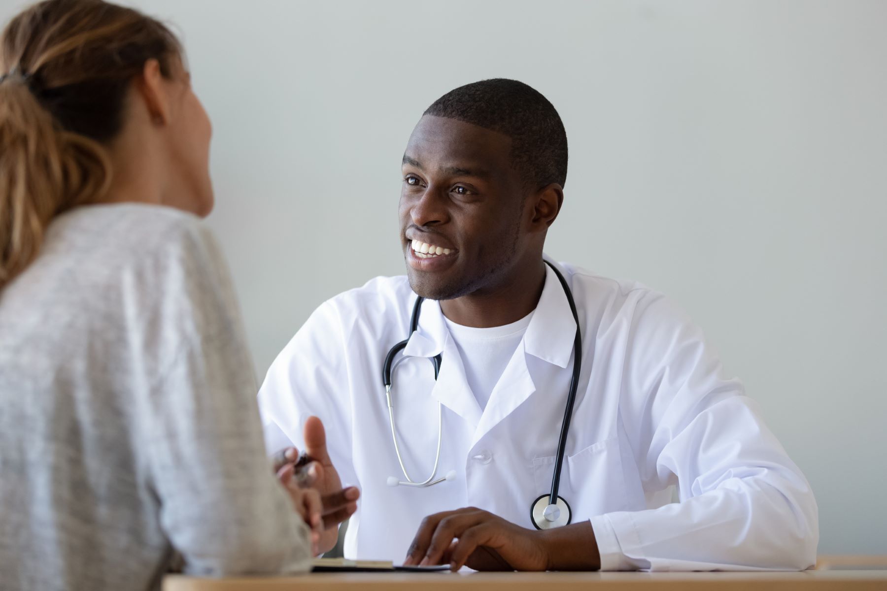 Surgeon discussing requirements for a hairline transplant