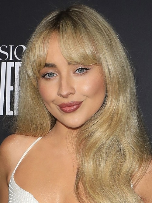 Sabrina Carpenter with Bardot bangs