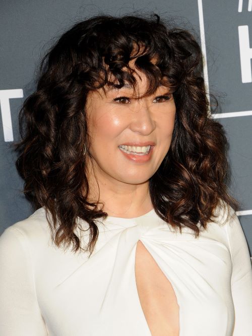 Sandra Oh with a curly fringe