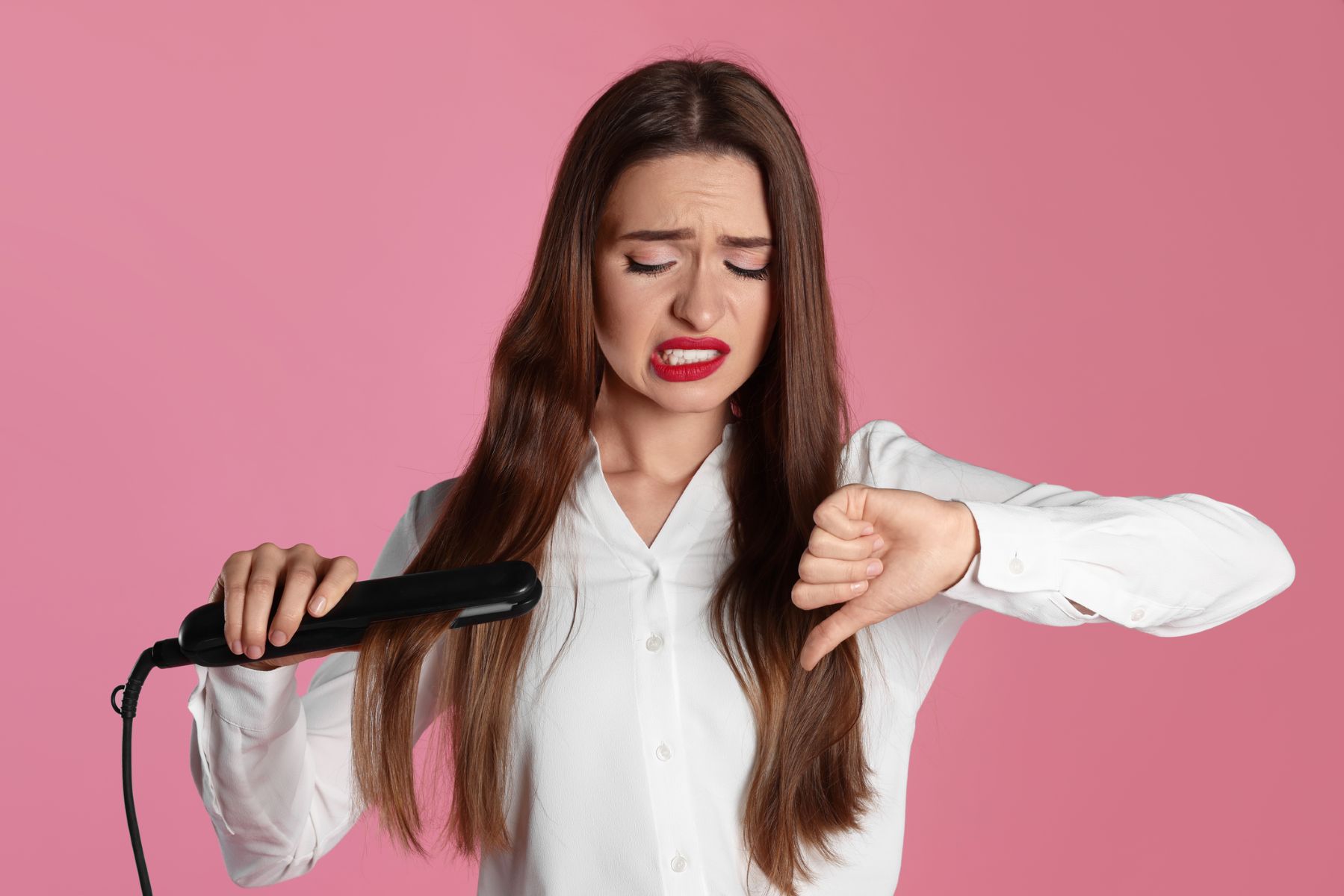 Woman disapproving of heat styling