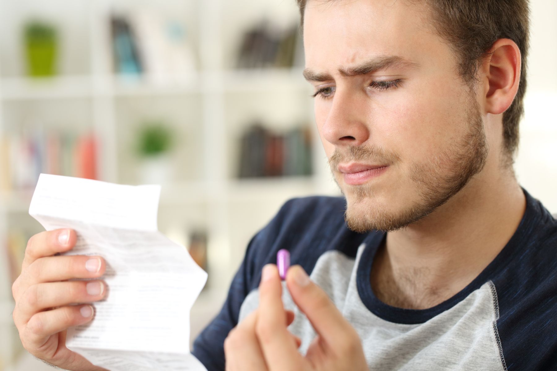 Man reading about Finasteride depression