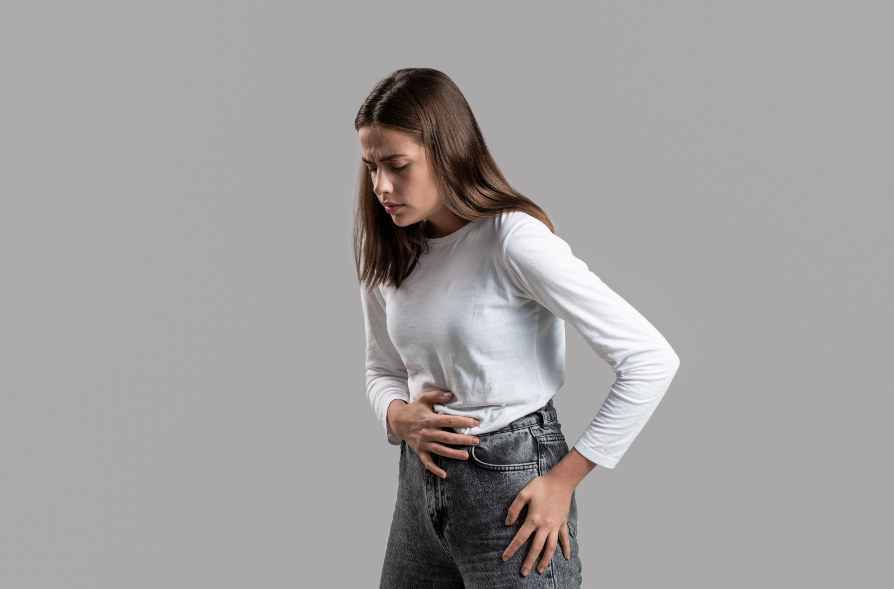 woman experiencing probiotic side effects