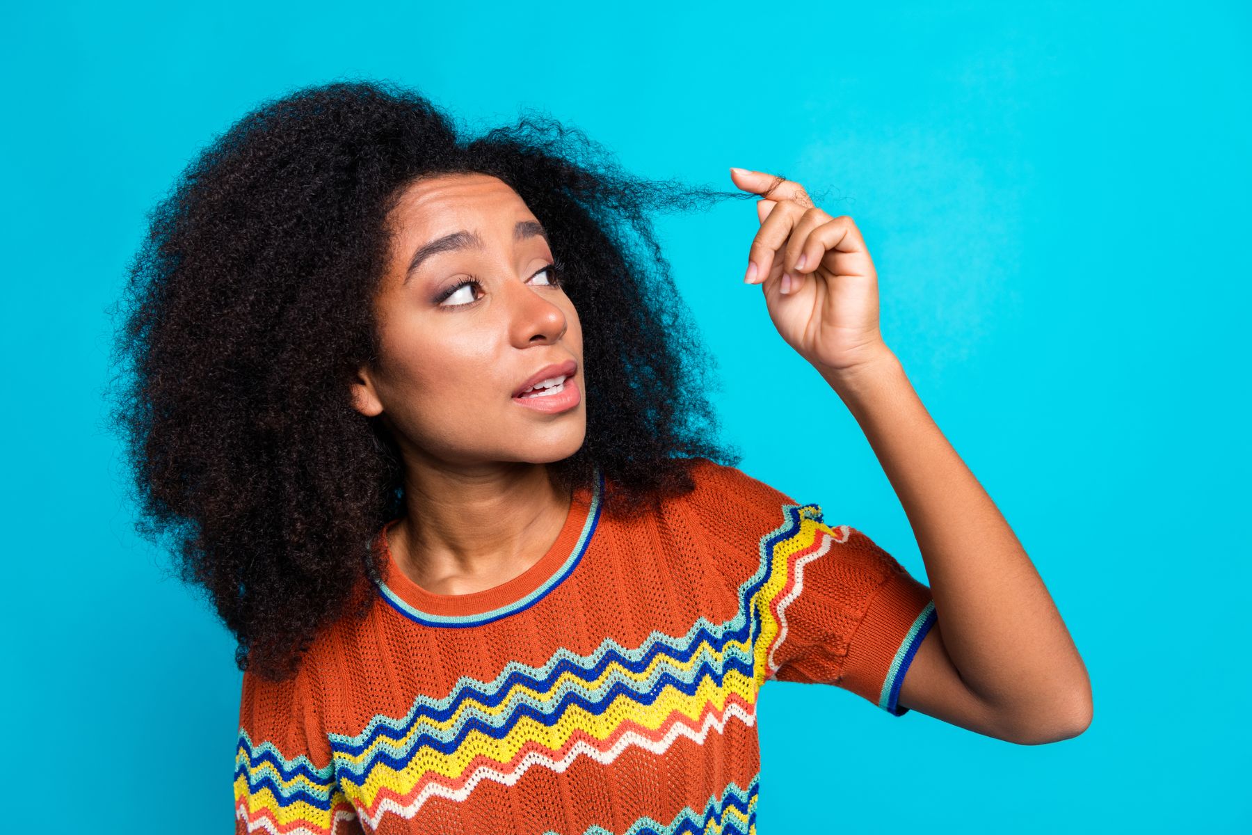 Woman with dry afro hair